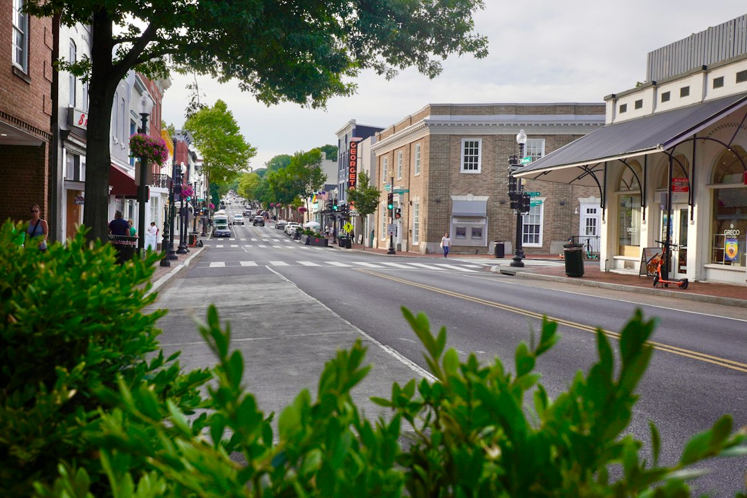 Street-level view of brick storefronts on a historic main street